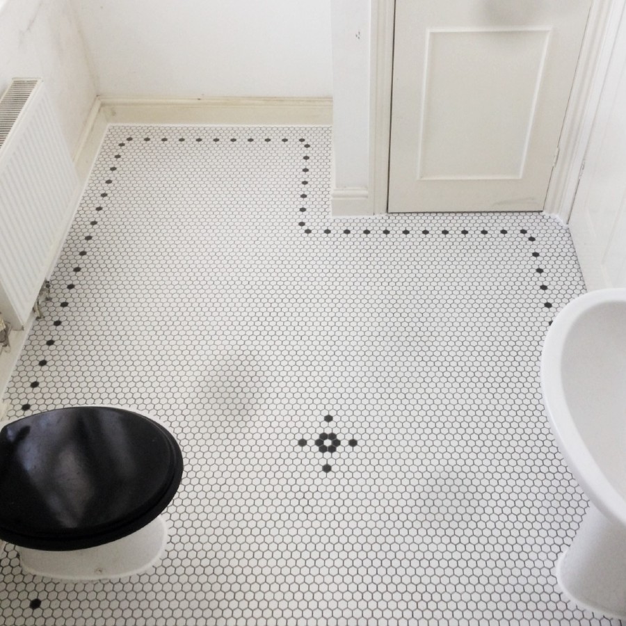 small black and white hexagonal bathroom floor